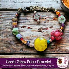 This fun Boho bracelet is crafted from Czech glass, Austrian crystal, semi precious gemstone and antique brass and gold findings. Great colors and eclectic style that makes a terrific gift!  Finished with antique brass and gold findings. Adjustable length from 6.25 to 8 inches. Gemstones: Carnelian is known for being a stone of courage, endurance, energy, leadership, and motivation. Bohemian Crystal Bracelet With Czech Glass Faceted Beads, Bohemian Czech Glass Crystal Bracelet With Faceted Beads, Bohemian Gold Beaded Glass Bracelets, Gold Bohemian Glass Beaded Bracelets, Handmade Bohemian Crystal Bracelet With Czech Glass, Handmade Bohemian Czech Glass Crystal Bracelet, Bohemian Czech Glass Crystal Bracelet, Bohemian Glass Crystal Bracelet For Gifts, Bohemian Glass Crystal Bracelet As Gift