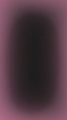 an abstract black and pink background with some white dots in the center, as if it were blurred or blurry