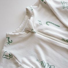 Dreamy nights await with our Holiday Bamboo Pajamas, where comfort meets the merriment of the season in an adorable, cuddly package. Crafted from an eco-friendly blend of 95% bamboo viscose and 5% spandex, these pajamas combine the ultra-soft touch of bamboo with just the right amount of stretch, ensuring your little one is snug and can move freely through their winter wonderland dreams. Our exclusive holiday collection comes in three cozy styles: Festive Footie Onesie: Perfect for the tiniest o Sock Booties, Bamboo Pajamas, Swim Sets, Knit Sweatshirt, One Piece Swim, Cozy Fashion, Holiday Collection, Winter Wonderland, Long Sleeve Tops