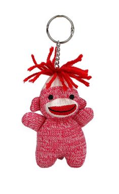 a red and white sock monkey key chain