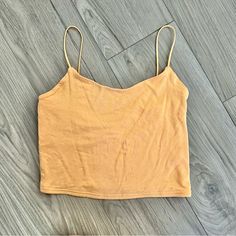 Pacsun Cropped Tank Top With Skinny Straps. The Fabric Is Very Soft, Never Been Worn Only Washed. New Without Tags! Orange Summer Crop Tank Top, Mustard Sleeveless Tank Top For Summer, Fitted Yellow Tank Top For Beach Season, Yellow Crop Top Tank Top For Summer, Yellow Spaghetti Strap Tank Top For Summer, Yellow Spaghetti Straps Tank Top For Summer, Yellow Tank Top For The Beach, Trendy Yellow Tank Top For Vacation, Yellow Summer Tank Top For Day Out