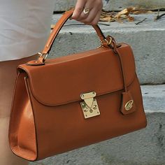 Sophisticated And Sleek, The Madison Top Handle Satchel Is Great For Every Occasion. Whether Used For Work Or A Night Out, The Madison Bag Adds Class And Sophistication To Every Outfit. 100% Genuine Pebbled Leather. The Madison, Leather Top, Pebbled Leather, Messenger Bag, Top Handle, Night Out, Satchel, Genuine Leather, Bag Lady