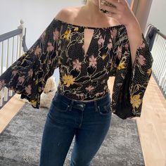 Free People Floral Top With Bell Sleeves. Never Worn In Great Condition. Very Cute And Flattering. Can Be Worn Off Or On The Shoulder. Top With Flowy Sleeves, Top With Bell Sleeves, Flowy Sleeves, Free People Black, Floral Top, Free People Tops, Bell Sleeves, Floral Tops, Free People