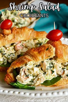 shrimp salad croissants on a white plate