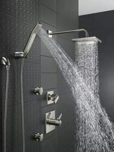 a shower head with water coming out of it