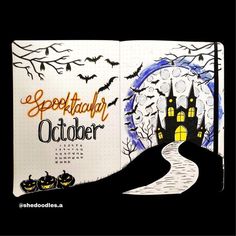 an open notebook with halloween themed pages