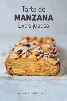 a close up of food on a plate with the words tarta de manzana extra jugosa