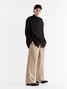 Editor's Notes Made from wool-blend, these contemporary trousers have wide legs with deep front tucks. Sleek and neat silhouette makes a refined look.- Zip and hook fastening- Two front slash pockets- Front tucks- Wide fitMeasurements (in.) M / L- Total Length: 42.5 in. / 42.7 in. - Rise: 11.0 in. / 11.2 in. - Waist: 15.6 in. / 16.5 in.  - Thigh: 14.8 in. / 15.0 in.- Hem: 11.0 in. / 11.2 in.   Model Info: Height 6' 1.2, Bust 36.6, Waist 28.0, Hip 34.6Composition & Care- 50% Wool, 50% Polyester- Recommend dry clean- Hand wash at 86°FDesigner- by Theballon MEN Wide Leg Trousers Outfit Men, Wide Leg Pants Outfit Men, Trousers Outfit Men, Thanksgiving Fit, Wide Leg Trousers Outfit, Wide Leg Pants Outfit, Pants Outfit Men, Trouser Outfit, Front Tuck