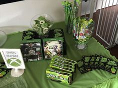 the table is set up with games and snacks