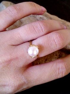 This ring features a delicate White Pearl gemstone set in 14k gold filled ring. => Gemstone Type -Natural Pearl => Gemstone Size - 8mm => Metal Type - 14k Gold Filled (Tarnish Resistant And Nickel Free) ♦ Replace the gemstone with many other gemstones we have in stock My another shops on Etsy http://www.CandySimpleJewelry.etsy.com http://www.CandyCrystalsJewelry.etsy.com Important information **My customer service is available 7 days a week ** All jewelry items will come to you nicely p 14k Gold Filled Round Band Wedding Rings, 14k Gold Filled Stackable Wedding Rings, 14k Gold Filled Open Rings For Wedding, Wedding Open Rings In 14k Gold Filled, Elegant Adjustable 14k Gold Filled Rings, Elegant 14k Gold Filled Promise Ring, 14k Gold Filled Toe Ring Jewelry For Wedding, 14k Gold Filled Toe Ring For Wedding, Elegant Stackable 14k Gold Filled Rings