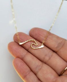 Handcrafted 14 Karat gold-filled  A great variation to my simple wave bar... just to step it up a bit 😊 Measuring just over an inch Great for every day wear Great for layering too! 14 Karat gold-filled chain Length of chain is your choice Preppy Necklaces, Jewelry Closet, Gold Pendent, Surf Jewelry, Beachy Jewelry, Preppy Jewelry, Wave Necklace, Diy Bracelets Patterns, Jewelry Accessories Ideas