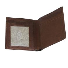 Cambridge Bi-Fold Wallet Slim Full Grain Leather Wallet Experience Unmatched Elegance with the Cambridge Bi-Fold Leather Wallet: Premium Full Grain Pull-Up Buffalo Leather: Crafted from high-quality full grain pull-up buffalo leather made in the US, ensuring rugged durability and a sophisticated appearance. Perfectly Slim Design: Slim enough for your front pocket, this mens wallet offers a sleek, minimalist look without sacrificing storage. Ample Storage Capacity: Holds up to four credit cards, Brown Rectangular Trifold Wallet With Coin Pocket, Brown Bifold Card Holder With Coin Pocket, Brown Card Holder With Id Window, Brown Trifold Wallet With Id Window, Brown Wallets With Id Window For Gift, Brown Wallet With Id Window As Gift, Brown Wallet With Id Window For Gift, Brown Trifold Wallet With Id Window For Business, Business Brown Trifold Wallet With Id Window