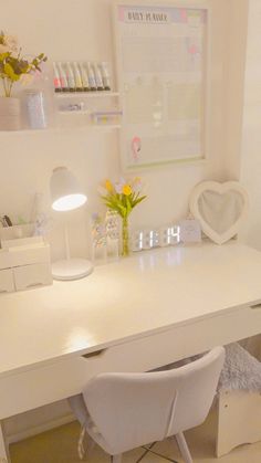 a white desk and chair in a room