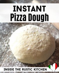 a pizza dough sitting on top of a wooden table