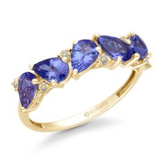 This exclusive tanzanite and yellow diamond ring set in 14k yellow gold is a brilliant design from our HEIRLOOM collection. This ring features 2.35 CTW of tanzanite and yellow diamonds. Our HEIRLOOM collection features colored gemstones - precious rubies, emeralds, tanzanites, and sapphires. In this collection, you will find an array of rich designs from statement cocktail rings to brilliant earrings and pendants characterized by a precious gemstone set in gold and accented with diamonds. Metal: Heirloom Ring, Yellow Diamond Ring, Heirloom Rings, Tanzanite Engagement Ring, Gold Amethyst Ring, Tanzanite Diamond Ring, Diamond Ring Set, Tanzanite Earrings, Yellow Diamonds