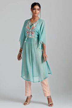 Aqua blue padded kaftan tunic with floral print, bead, thread embroidery in  floral patchwork pattern. Paired with inner bustier and mirror stripe embroidered trouser. - Aza Fashions Bohemian Blue Chanderi Kurta, Georgette Kurta With Floral Embroidery For Navratri, Blue Bohemian Kurta With Dupatta, Embroidered Anarkali Style Georgette Kaftan, Embroidered Anarkali Georgette Kaftan, Blue Bohemian Kurta With Traditional Drape, Intricate Embroidered Georgette Kaftan For Eid, Intricate Embroidery Georgette Kaftan For Eid, Blue Bohemian Kurta With Resham Embroidery