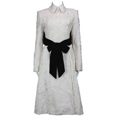 Iconic & Collectible TOM FORD for YVES SAINT LAURENT Coat F/W 2002 Collection French Size 36 - US 4 Color – Cream Created from Silk Blend Jacquard Fabric, Two Front Side Pockets, Adorned With Black Removable Velvet Belt. Hook and Eye Closure, Fully Lined. Measurements approx.: Length - 45 inches, Bust - 32", Waist - 27", Sleeve - 25". Made in France. Excellent Condition. Saint Laurent Coat, Silk Coat, Runway Collection, Jacquard Fabric, Outerwear Coats, Tom Ford, Runway Fashion, Yves Saint Laurent, Saint Laurent