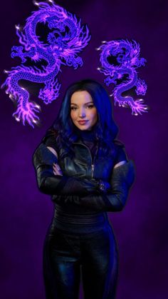 a woman with her arms crossed standing in front of a purple background and two dragon heads above her head