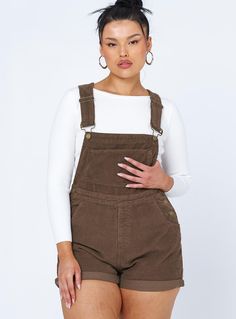 Overalls    100% cotton  Alicia is wearing a size AU 14 / US 10  Cord material  Adjustable buckle straps  Button fastening at sides  Large chest pocket    Classic four pockets   Gold-toned hardware   Fixed rolled hem  Non-stretch   Unlined Overalls Brown, Brown Overalls, Spring Rompers, Baby Crop Top, Black Overalls, Pink Formal Dresses, Festival Tops, Playsuit Romper, Strapless Tops