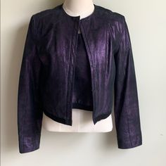 Wilson Suede Leather Cropped Jacket With A Matching Tank Top. The Jacket Is A Size L And The Tank Top Is A M. The Jacket Is A Beautiful Purple Shiny Suede With A Black Knit Trim At The Bottom. It Has Padded Shoulders And Hook Closures In The Front. It Was Only Worn A Couple Of Times. It Comes With A Matching Tank That’s Brand New With Tags And Has Never Been Worn. It Has A Zipper Across The Back And Matching Black Knit Trim At The Bottom. The Jacket Measures 19” In Length And Ptp 19” Purple Outerwear For Spring Night Out, Purple Outerwear For Evening In Fall, Wilsons Leather Jacket, Cropped Jacket, Crop Jacket, Black Knit, Suede Leather, Leather Jacket, Jackets For Women