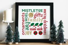 a framed christmas print with the words mistlete, gifts, and holly on it