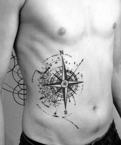 a man with a compass tattoo on his chest