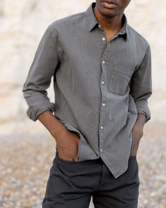 Porto Shirt in Ink Introducing the Porto Shirt in Ink, a luxurious addition to your wardrobe. Crafted from organic cotton and natural dyes made from minerals, this deep grey button-up shirt is both elegant and environmentally friendly. With 100% biodegradable corozo buttons, it's not only compostable but also stylish. Upgrade your style with this sustainable must-have. Alex Crane, Deep Gray, Mens Button Up, Perfect Body, Natural Dyes, Dark Gray, Biodegradable Products, Must Haves, Button Up Shirts