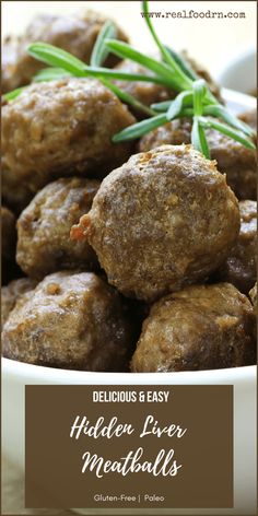 meatballs in a white bowl with rosemary garnish on top and the words delicious & easy hidden liver meatballs