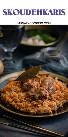 a close up of a plate of food with chopsticks