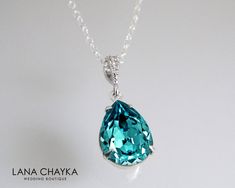 Swarovski Light Turquoise Teal Teardrop Crystal Rhinestone 925 Sterling Silver Chain Bridal Bridesmaid Wedding Necklace. Classy and elegant, this necklace would be perfect for any wedding or occasion! CHAIN is 18 inches (45.7 cm) long, PENDANT is about 1 inch (2.5 cm) long including bail. MATCHING EARRINGS: https://www.etsy.com/listing/124449021/wedding-bridesmaids-gift-earrings?ref=shop_home_active This necklace is made with 925 Sterling Silver 18 inches chain, Swarovski 14x10mm Light Turquoise Blue Teardrop Necklace For Wedding, Green Teardrop Pendant Necklace For Wedding, Green Teardrop Bridal Necklace For Wedding, Elegant Turquoise Bridal Necklace For Wedding, Turquoise Teardrop Wedding Jewelry, Teal Jewelry, Teal Necklace, Bridesmaid Gifts Earrings, Wedding Pendant