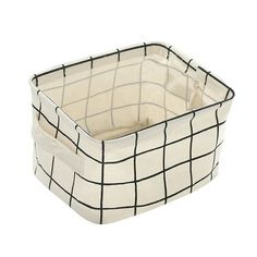 a white basket with black lines on the sides and bottom, sitting in front of a white background