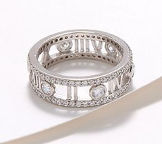 We've got your number. Encrusted with cubic zirconia Diamonique simulated diamonds, this bold band ring embraces a return to the classics with a Roman numeral motif. White Gold Wedding Bands, Silver Wedding Rings, Roman Numeral, Ring Size Guide, Roman Numerals, Ring Sterling Silver, Eternity Bands, Silver Diamonds, Band Ring