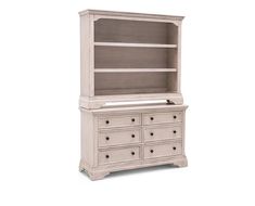 a white dresser with drawers and shelves on the top, in front of a white background