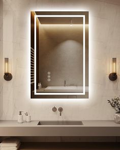 a bathroom with a sink, mirror and lights on the wall above it's counter