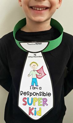 a young boy wearing a tie that says, i am a responsible responsible responsible responsible responsible responsible responsible responsible responsible responsible responsible responsible responsible responsible responsible responsible responsible responsible responsible