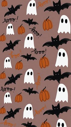 a group of bats and pumpkins on a brown background