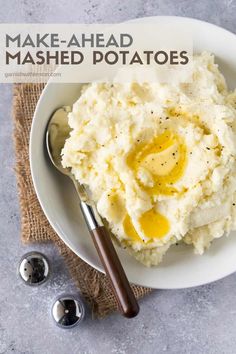 mashed potatoes with butter and olive oil in a white bowl