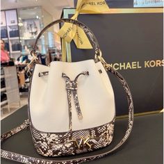 Michael Kors Reed Bucket Snake Crossbody Shoulder Bag Leather Size: Medium 10 In X 8.5 In X 5.5 In 25cm X 22cm X 14cm Michael Kors Leather Bucket Bag With Detachable Strap, Luxury Michael Kors Crossbody Bucket Bag, Michael Kors White Pouch Bag, Michael Kors Bucket Bag With Detachable Strap For Shopping, White Michael Kors Pouch Bag, Luxury Michael Kors Bucket Bag With Detachable Strap, Elegant Michael Kors Bucket Bag With Adjustable Strap, Elegant Michael Kors Crossbody Bucket Bag, Luxury Michael Kors Bucket Bag For Shopping