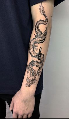 a person with a tattoo on their arm