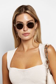 This clear framed style of sunglasses allows you to keep it classy. These retro-inspired frames are mid-size and are sure to turn heads. Emi Jay, Clear Sunglasses, Montce Swim, Only Hearts, Stacked Necklaces, Dress Hairstyles, Keep It Classy, Italian Summer, Mid Size