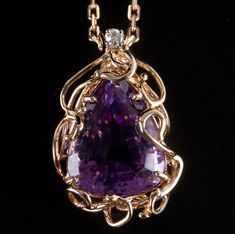 14k Yellow Gold Pear Amethyst Solitaire Necklace W/ Diamond Accent 12.64ctwMetal Information: 14k Yellow GoldTotal Weight: 10.5gChain Width: 1.2mmChain Length: 16"Pendant Dimensions: 28.3mm x 18.6mmStone InformationMain StoneGem Type: AmethystShape: Pear (17 x 14mm)Color: PurpleClarity/Quality: AACarat Weight: 12.59ctNumber of Stones: 1Accent StoneGem Type: DiamondShape: Round (2.3mm)Color: HClarity/Quality: SI1Carat Weight: .05ctNumber of Stones: 1Total estimated ctw (carat total weight): 12.64 Luxury Purple Teardrop Jewelry, Luxury Purple Pear-shaped Jewelry, Fine Jewelry Purple Pear-shaped Jewelry, Solitaire Necklace, Solitaire Necklaces, Gold Jewelry Fashion, Gold Jewelry, Pear, Amethyst