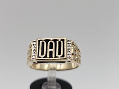 Vintage 10K Yellow Gold Diamond and Black Onyx Nugget Style Dad Signet Ring  Size 10 Item w#3572 This Vintage 10k Yellow Gold Dad Ring features a bold nugget style design, highlighted by a striking black onyx center and subtle diamond accents. Perfect for the man who appreciates vintage style, this ring is a meaningful and stylish gift. Material: 10k Yellow Gold Gemstone: Black Onyx Natural Diamond Accents: Very small, adding a touch of sparkle Weight: 4.5 grams Width: 9.6mm Size: 10 Condition: Dad Ring, Signet Ring Vintage, Vintage Native American Jewelry, Vintage Designer Jewelry, Gold Signet Ring, Size 10 Rings, Stylish Gifts, Ring Vintage, Native American Jewelry