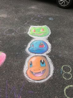 some chalk drawings are on the ground