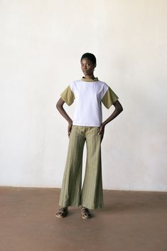 A two-toned update to our beloved tee, with a slightly longer length and added mock neckline, in the softest organic cotton. Our signature pick stitch at the the sleeve and bottom hem. Naturally dyed using the earth, radish-herb is an alternating subtle lilac and earthy olive green. Organic Cotton Short Sleeve Conscious Top, Casual Tops In Natural Dye Organic Cotton, Casual Organic Cotton Tops With Natural Dye, Casual Organic Cotton Top With Natural Dye, Everyday Cotton Tops With Natural Dye, Spring Crew Neck Tops With Natural Dye, Cotton Tops With Natural Dye And Short Sleeves, Natural Dye Short Sleeve Top For Spring, Spring Short Sleeve Top With Natural Dye