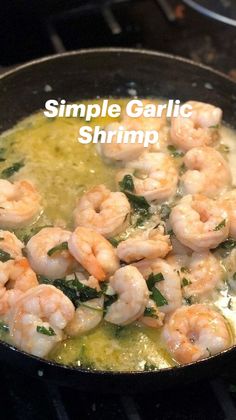 shrimp cooking in a skillet on the stove