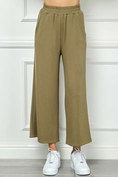 Very soft-cropped wide pants are a comfortable and trendy fashion choice. Comfortable Stretch Wide Leg Pants, Casual Solid Color Capri Length Pants, Spring Stretch Culottes With Elastic Waistband, Comfortable Solid Color Wide Leg Pants For Fall, Comfortable Solid Wide Leg Pants For Fall, Comfortable Non-stretch Wide Leg Loungewear Pants, Spring Stretch Culottes With Pockets, Casual Relaxed Fit Cropped Culottes, Non-stretch Wide Leg Pants For Loungewear