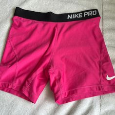 Nike Pro Pink Shorts Nike Short Leg Bottoms For Sports Events, Pink Go-dry Training Bottoms, Pink Go-dry Bottoms For Training, Sporty Short Sports Pants, Sporty Short Pants For Sports, Sporty Pants For Sports, Sporty Short Length Pants For Sports, Sporty Short Cargo Pants, Nike Pink Athletic Shorts