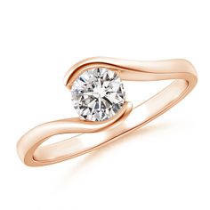 a rose gold engagement ring with a round diamond in the center, on a white background