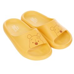 PRICES MAY VARY. Favorite Character: Get your fashion on with these slide sandals featuring Winnie the Pooh. Each shoe has a colorful print with your favorite Winnie the Pooh poses. Winnie-the-Pooh: Winnie-the-Pooh is a good-natured, yellow-furred, honey-loving bear who lives in the Forest surrounding the Hundred Acre Wood. He is described as being "a bear of very little brain". He is generally kind and friendly towards everyone and has a demeanor that is childlike and innocent. Officially Licen Slip On Slippers, Classic Winnie The Pooh, Fashion Slides, Disney Memes, Disney Merchandise, Kids Luggage, Disney Ladies, Disney Winnie The Pooh, Pharmacy Gifts