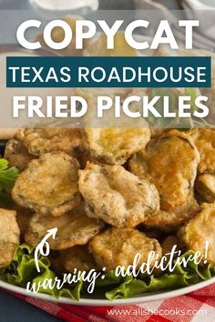 a white plate topped with fried pickles on top of a red checkered table cloth